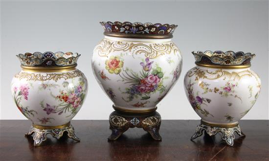 Three French flower painted porcelain champleve enamel and bronze mounted vases, c.1900, 15.5cm - 21cm